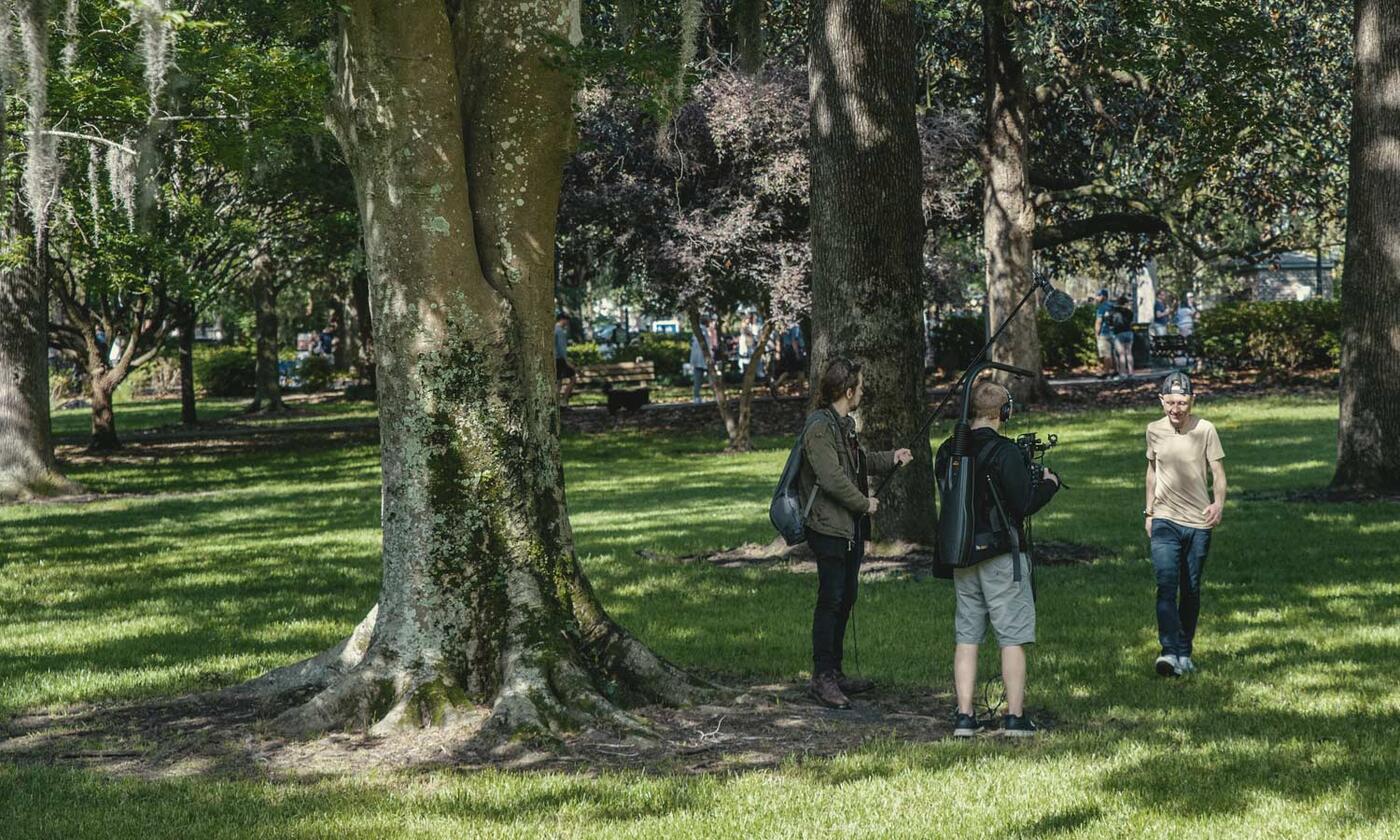 TV crew filming Elliott Bambrough beside Candler Live Oak Tree